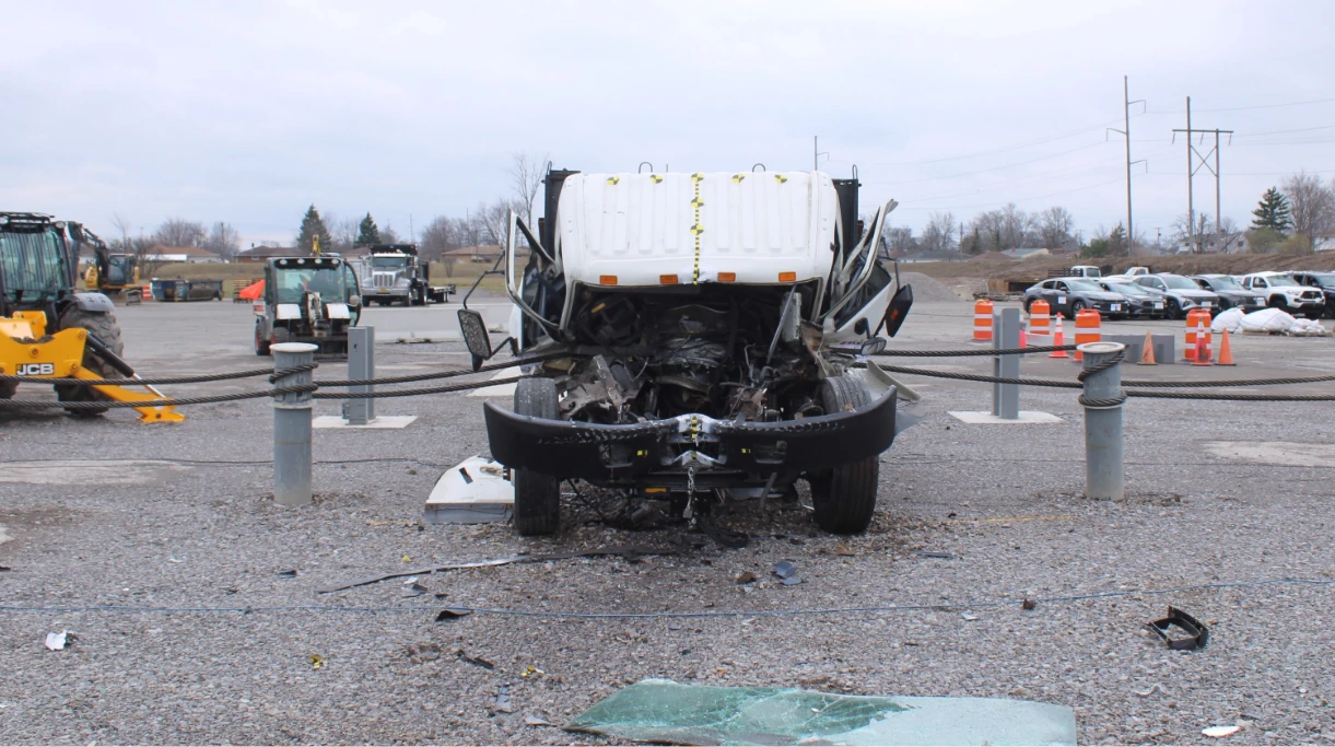 Vehicle stopped by Valkyrie cable barrier posts during a crash test