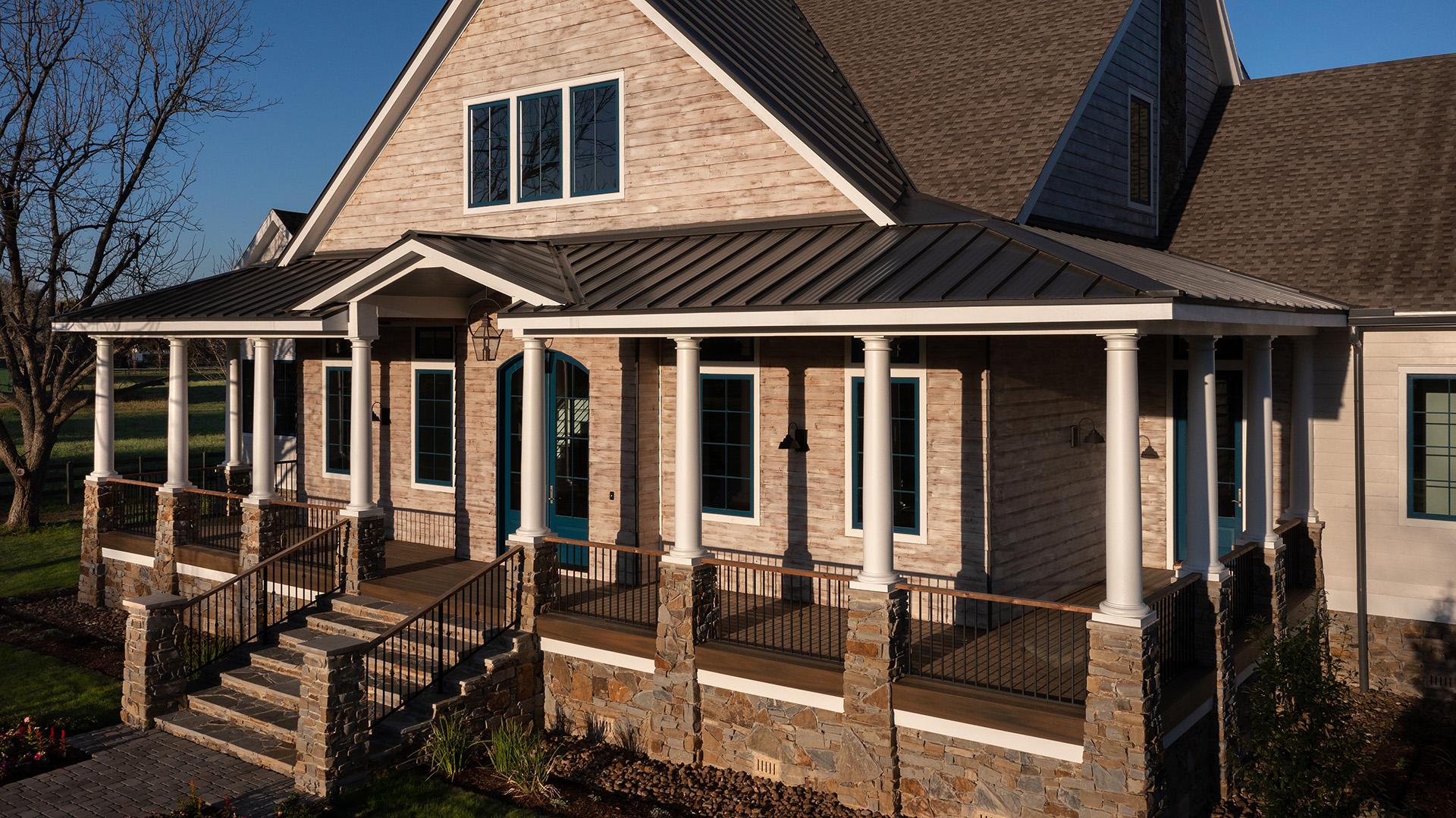 Steel railing system enhanced the curb appeal and weather resilience of a front porch.