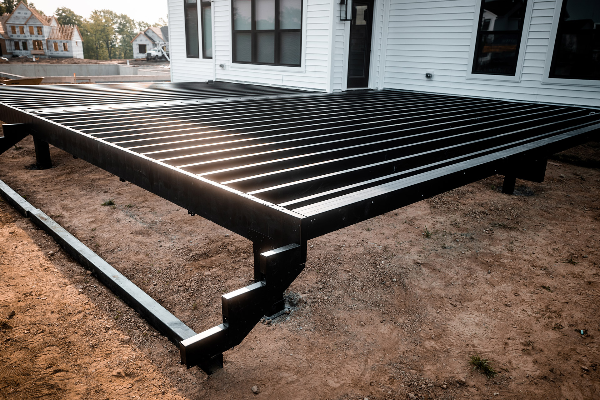 Newly installed steel deck framing showcasing its strength and large spans in residential settings.