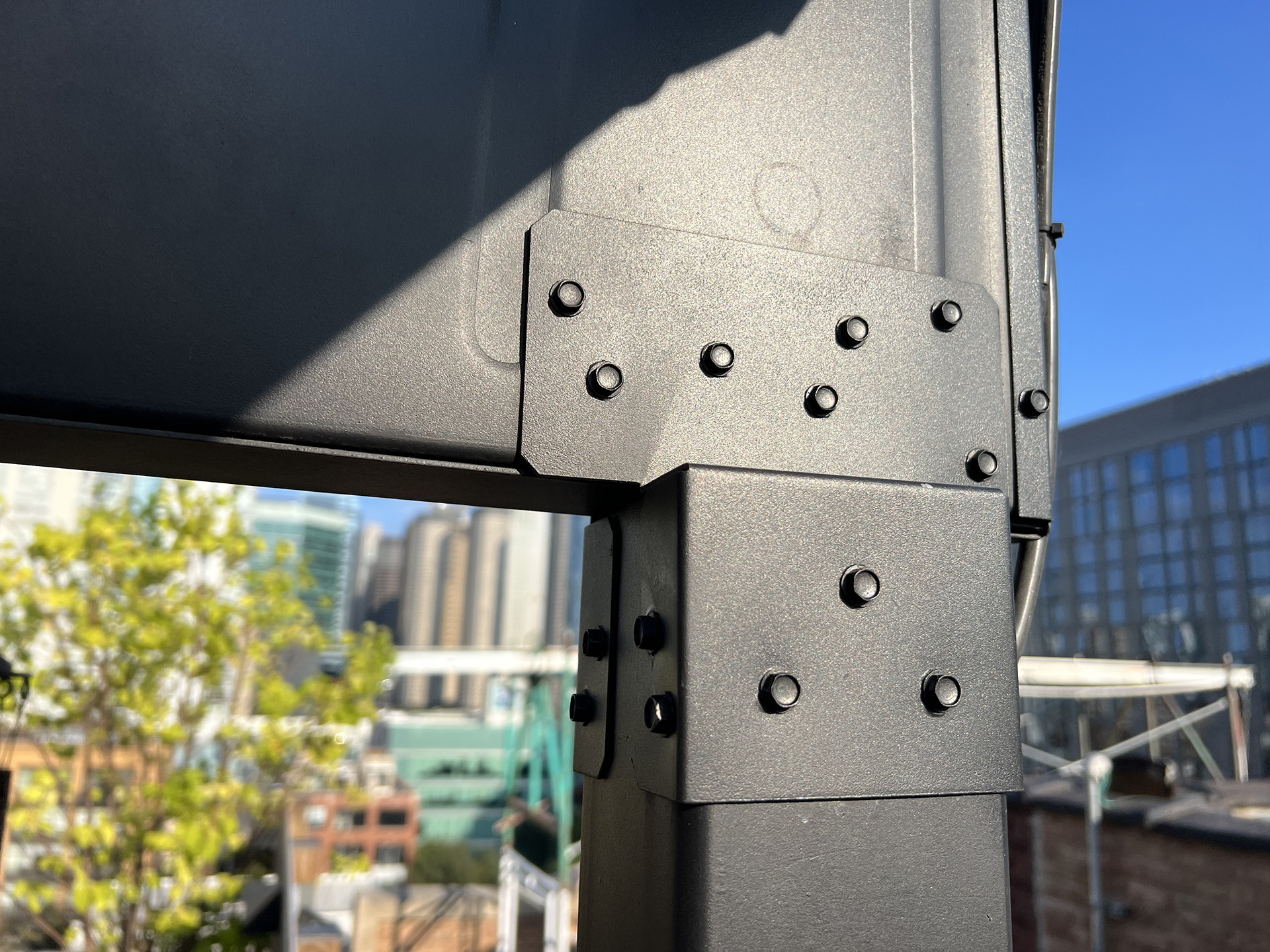 Steel pergola joint, highlighting the sturdy construction and weather-resistant materials.